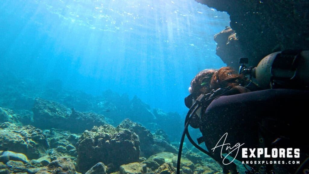 Scuba Diver exiting cave at Makena Landing/5 Caves
