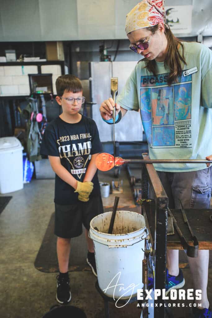 instruction during glass blowing class