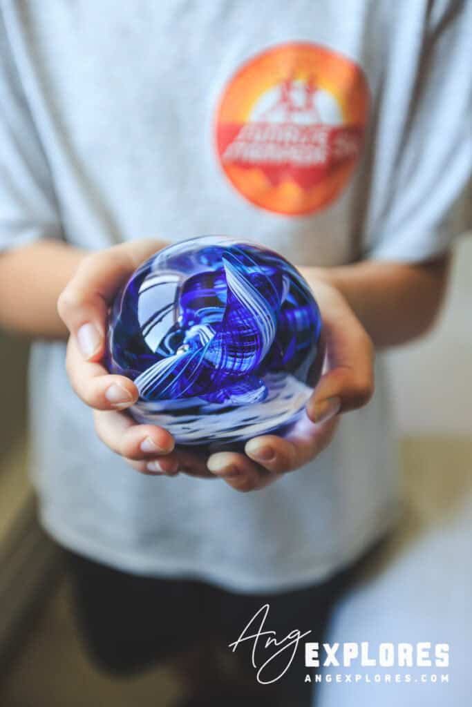 blue and white glass paperweight